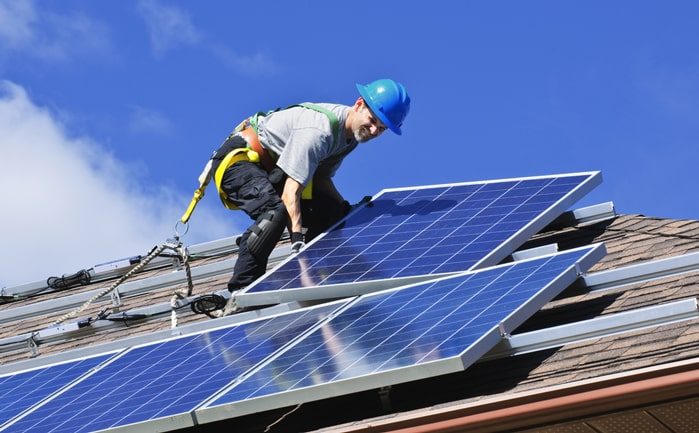 Technician Working on Solar Panel Installation — Solar Power Services in Central Coast, NSW