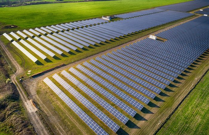Field with Solar Panels — Solar Power Services in Erina, NSW